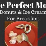 A red plate topped with donuts and ice cream.