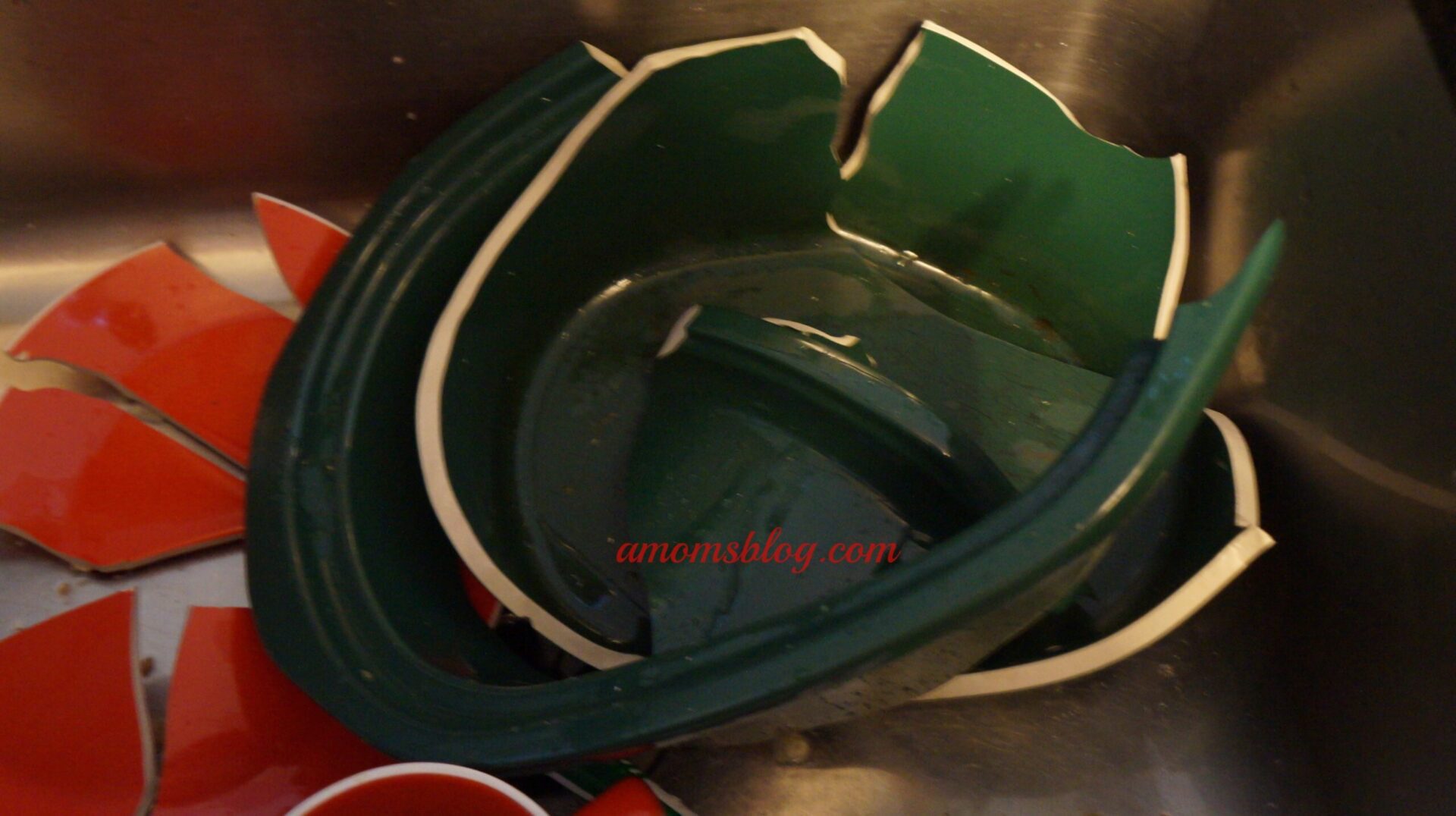 A green plastic hat sitting on top of a table.