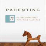 A wooden horse sitting in front of the word " parenting ".