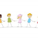 A group of children holding hands in a row.