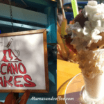 A sign and a cup of ice cream