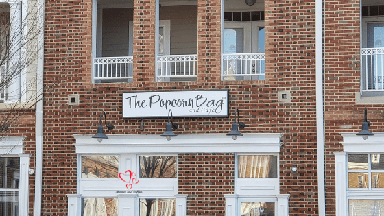 A building with the sign for the popcorn bag.